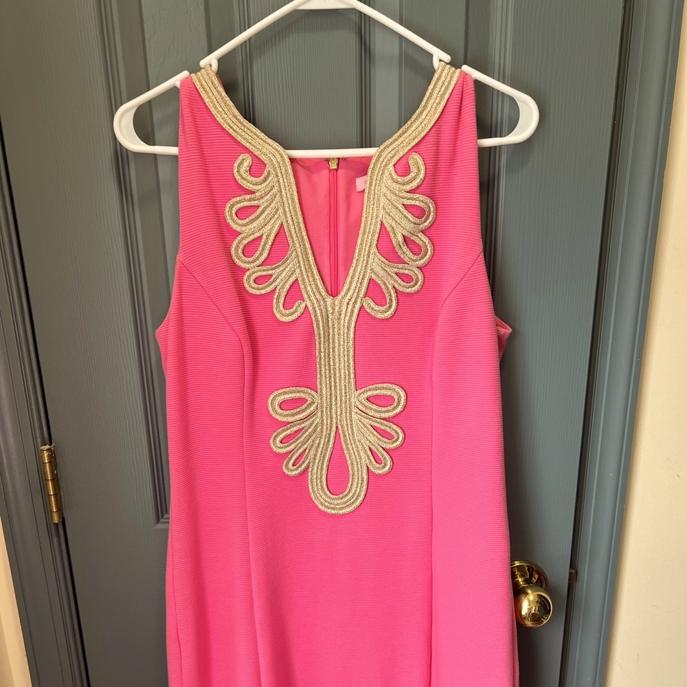 Pink Lilypulitzer dress. Size Large. Gold stitching and design on chest.